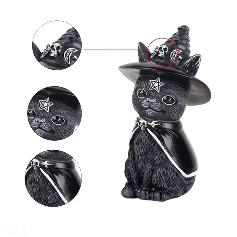 Black cat figurine wearing a witch hat with star and moon designs on a white background.