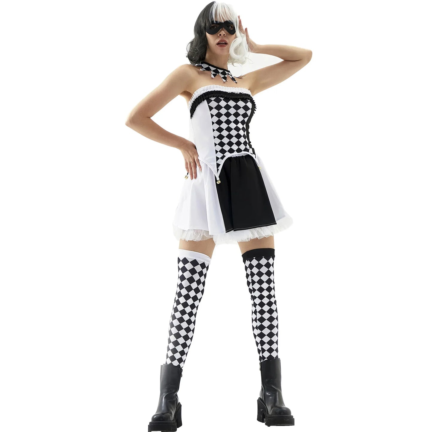 Person wearing a black and white checkered costume with a dress and stockings on a white background