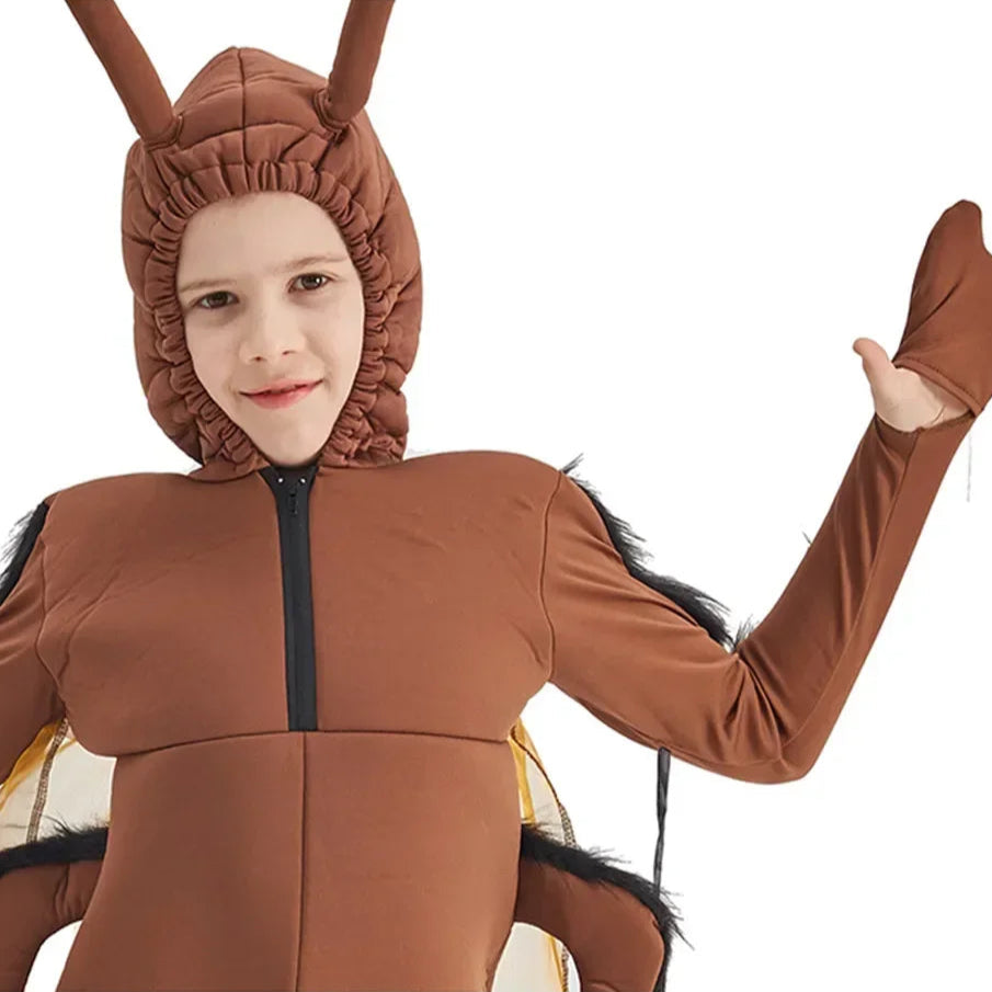 Child wearing a brown spider costume on a white background