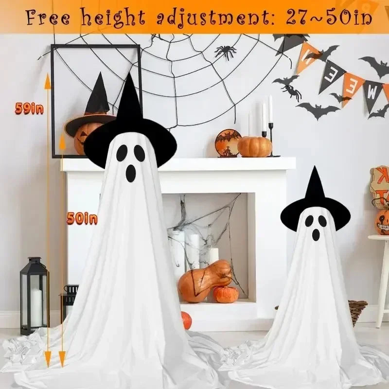 Halloween-themed room with ghost decorations, pumpkins, and decorative text on a white wall.