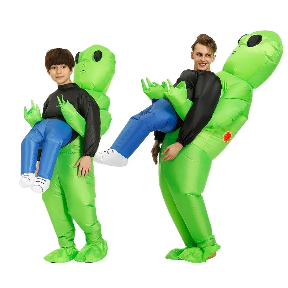 Two people in inflatable alien costumes, one holding the other on a white background.