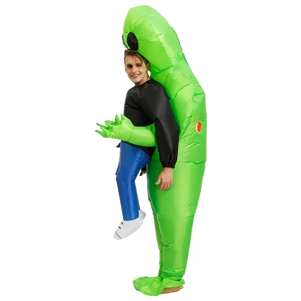 Person wearing a green inflatable costume on a white background