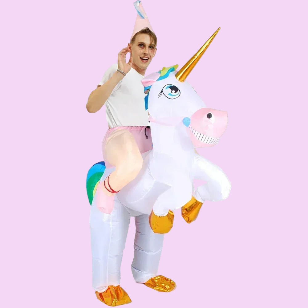 Person wearing an inflatable unicorn costume on a white background