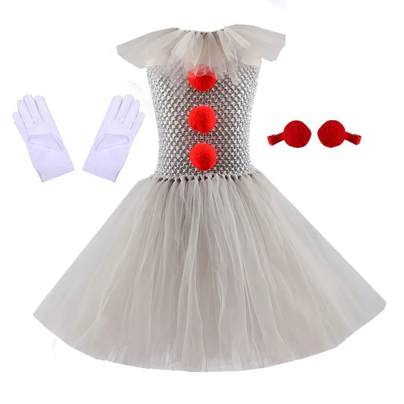 White dress with red polka dots, gloves, and hair accessories on a white background