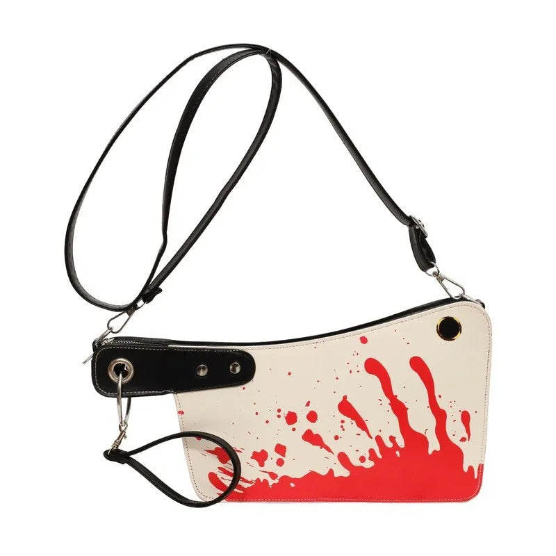 Purse with red and white splatter design on a white background