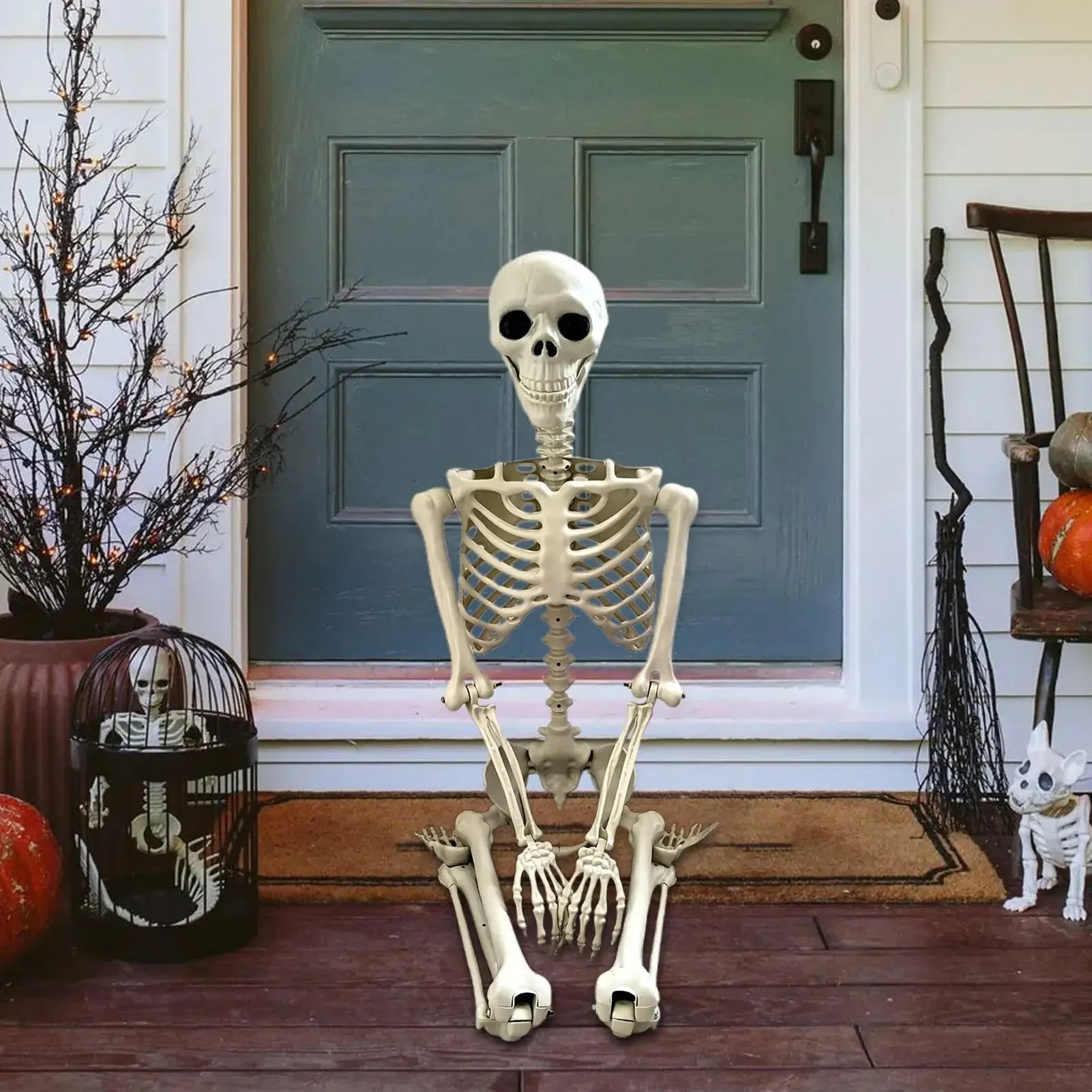 Skeleton figure on a front porch with Halloween decorations