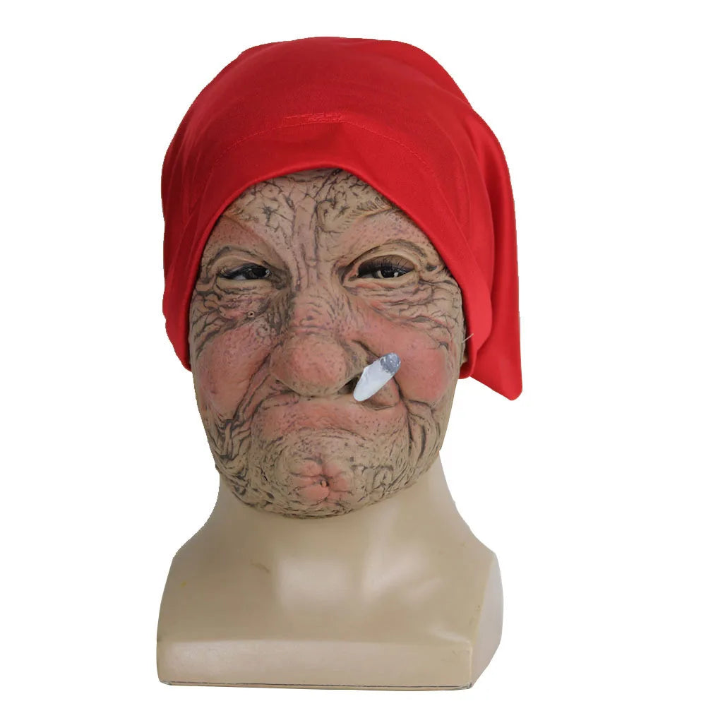 Mask with a red hood and textured face on a mannequin head against a white background