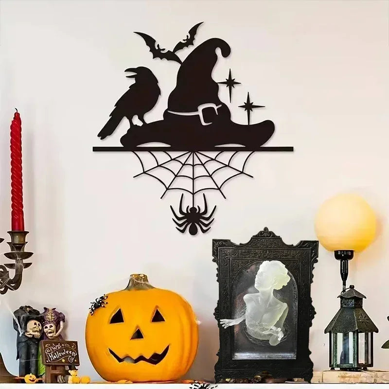Halloween-themed wall decoration with a witch's hat, spider, and pumpkin on a white background.