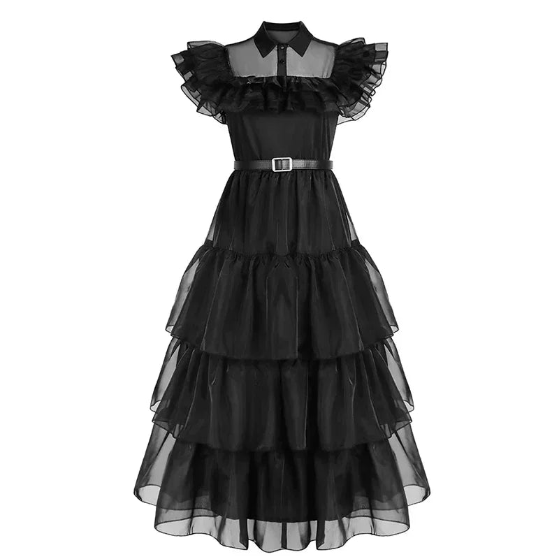 Black tiered dress with sheer sleeves and collar on a white background