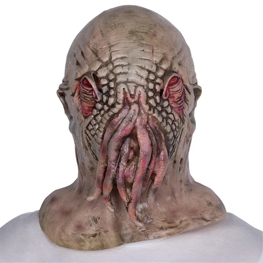 Creepy mask with tentacle-like appendages on a white background