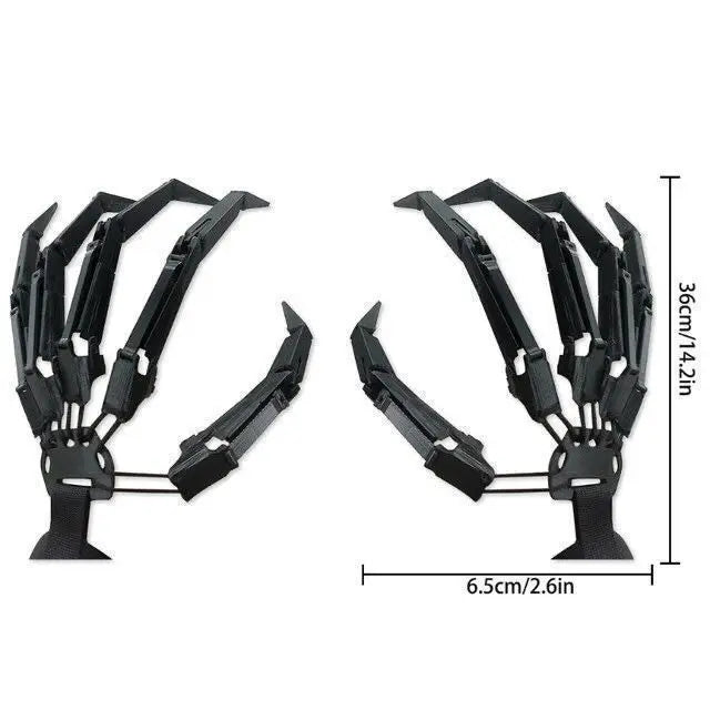 Pair of black mechanical claw hands with measurements on a white background