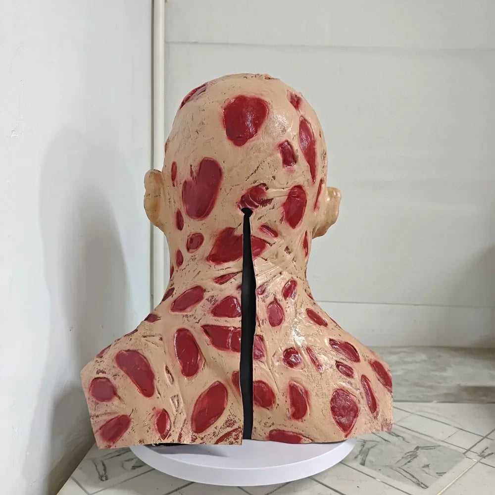 Model of a human head and neck with visible muscles on a white background