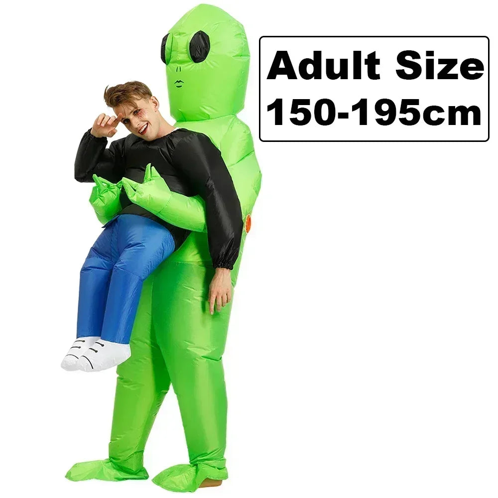 Person in a green inflatable alien costume with text indicating adult size range.