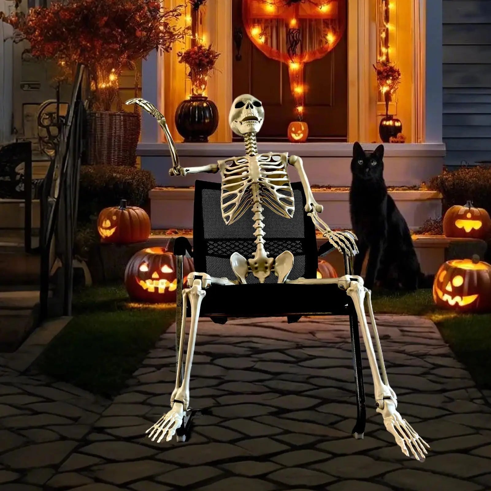 Halloween-themed outdoor scene with a skeleton sitting on a chair, pumpkins, and a black cat.