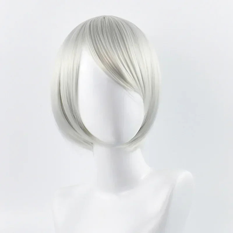 Silver wig on a mannequin head against a white background