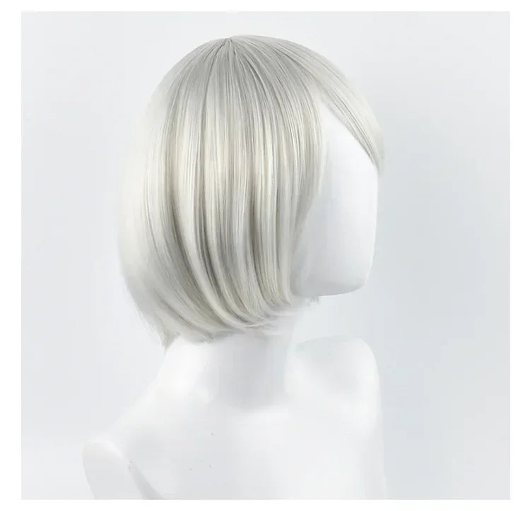 Silver and white wig on a mannequin head against a white background
