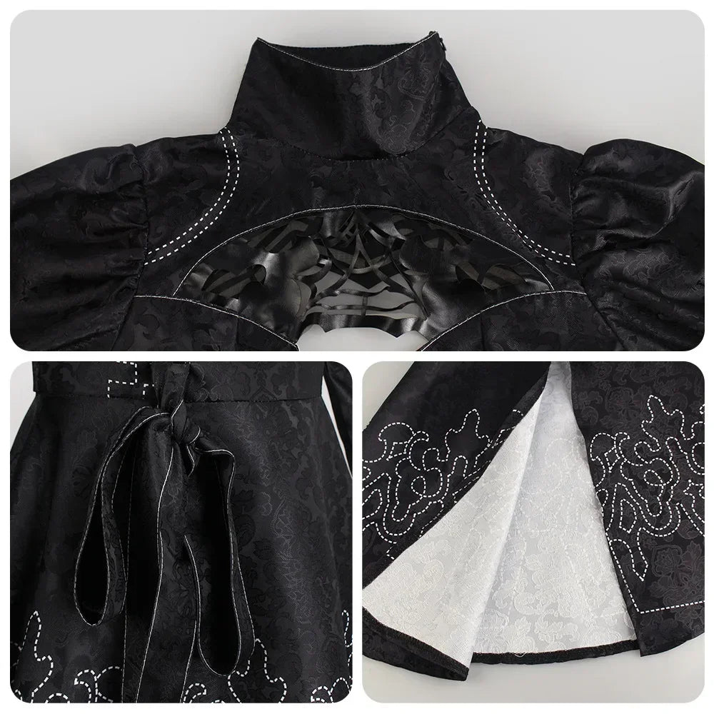 Black embroidered garment with close-up details on a white background