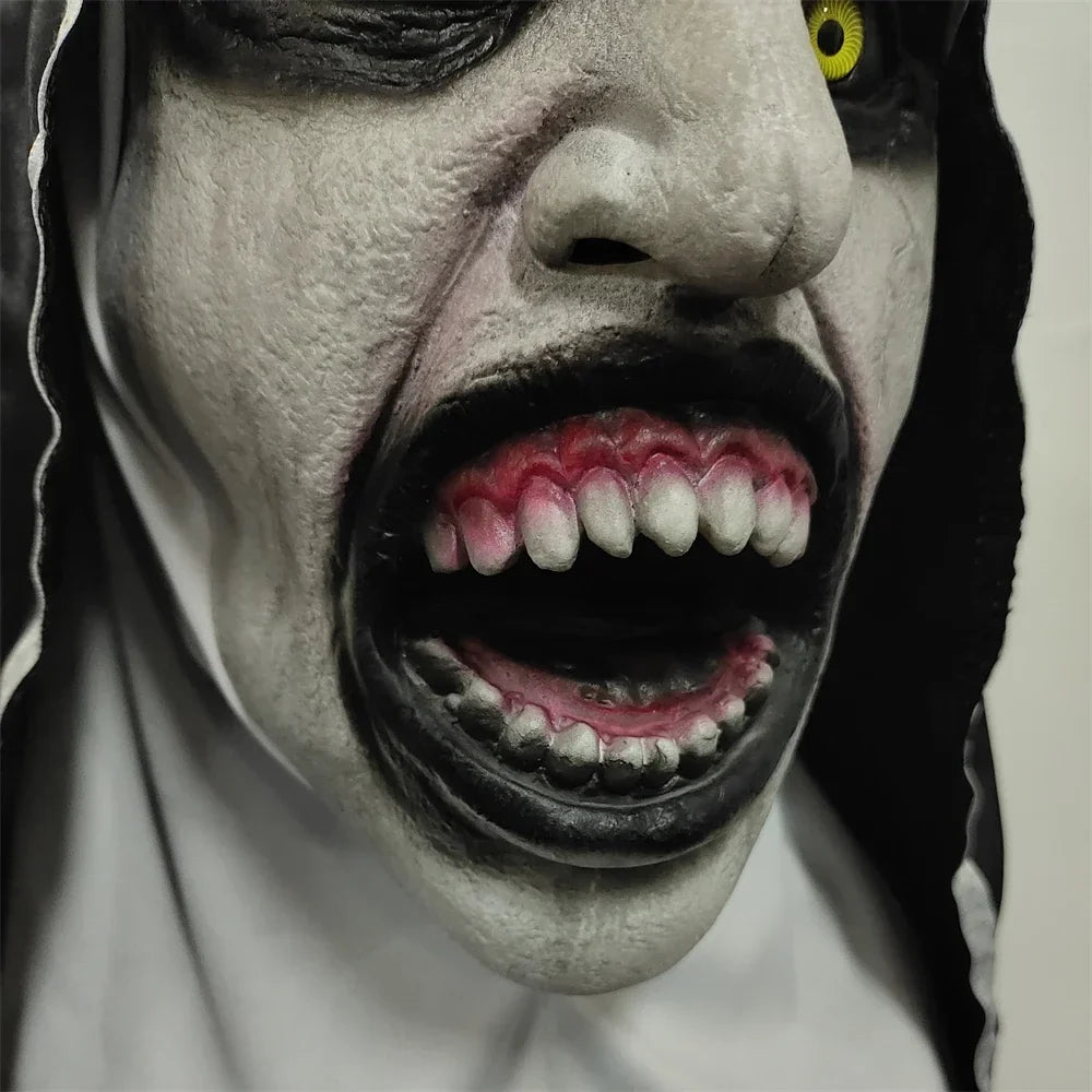 Close-up of a person with a dramatic makeup effect, including a wide open mouth and dark eye.