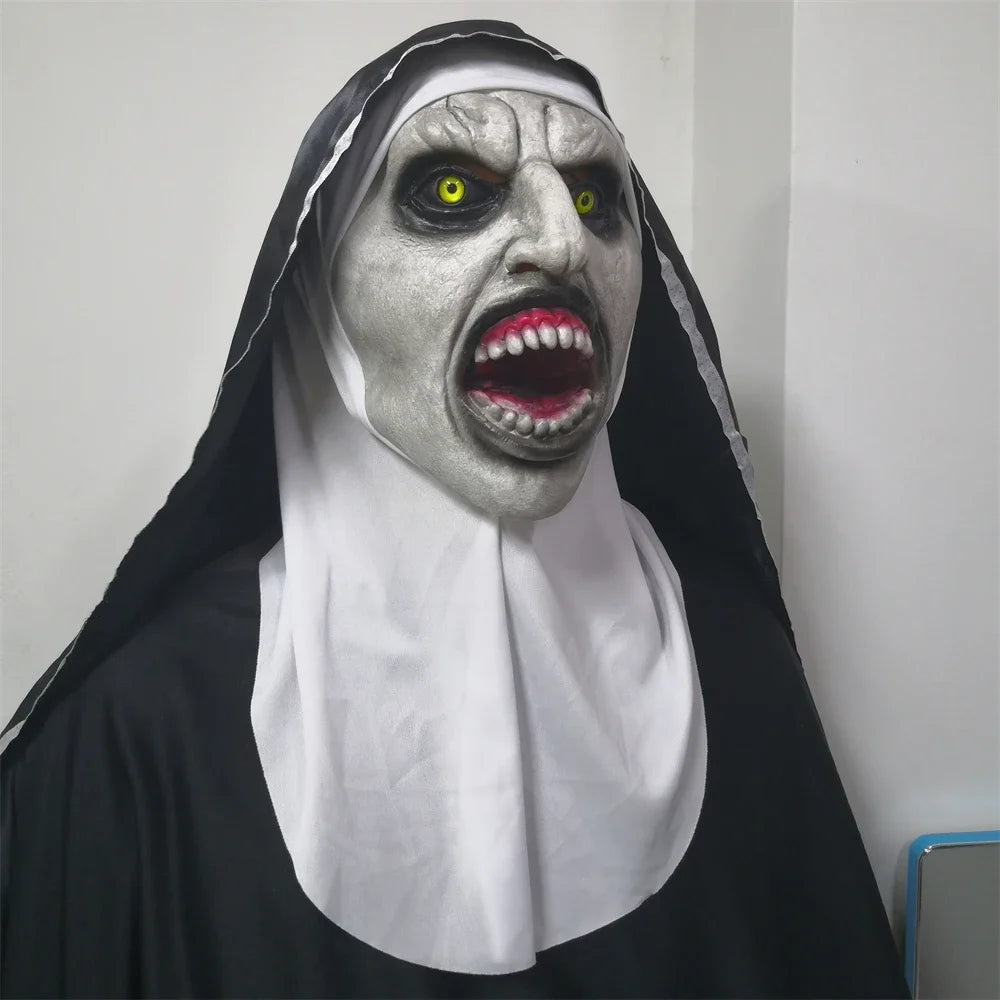Person wearing a nun costume with a scary makeup look on a plain background