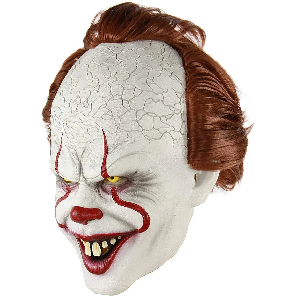 Scary clown mask with cracked texture and red hair on a white background