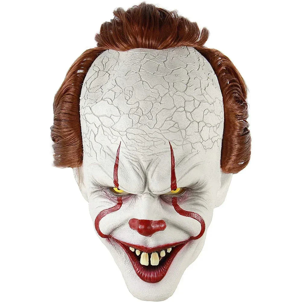 Scary clown mask with cracked white face, red hair, yellow eyes, and red lips on a white background