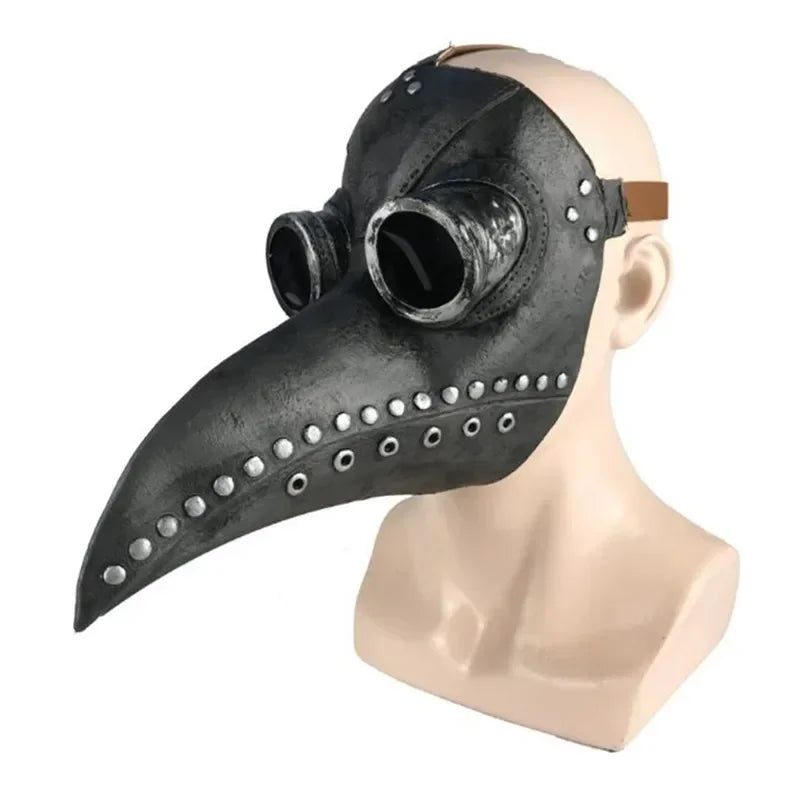 Black plague doctor mask on a mannequin head against a white background