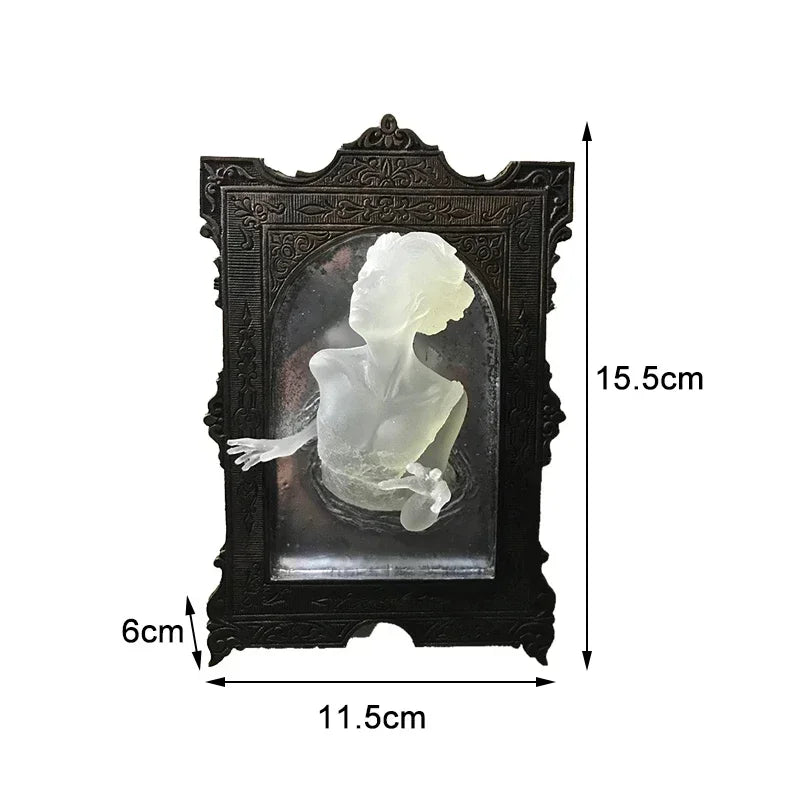 Decorative black frame with a white sculpture inside, showing dimensions on a white background.