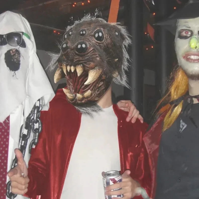 Three people in Halloween costumes with masks and makeup.