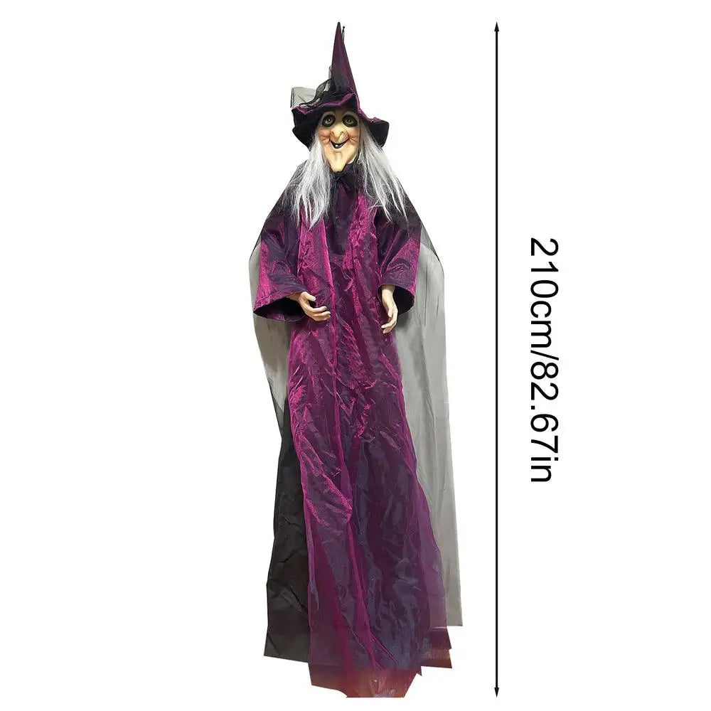 Halloween witch decoration with purple robe and pointed hat, height measurement on a white background