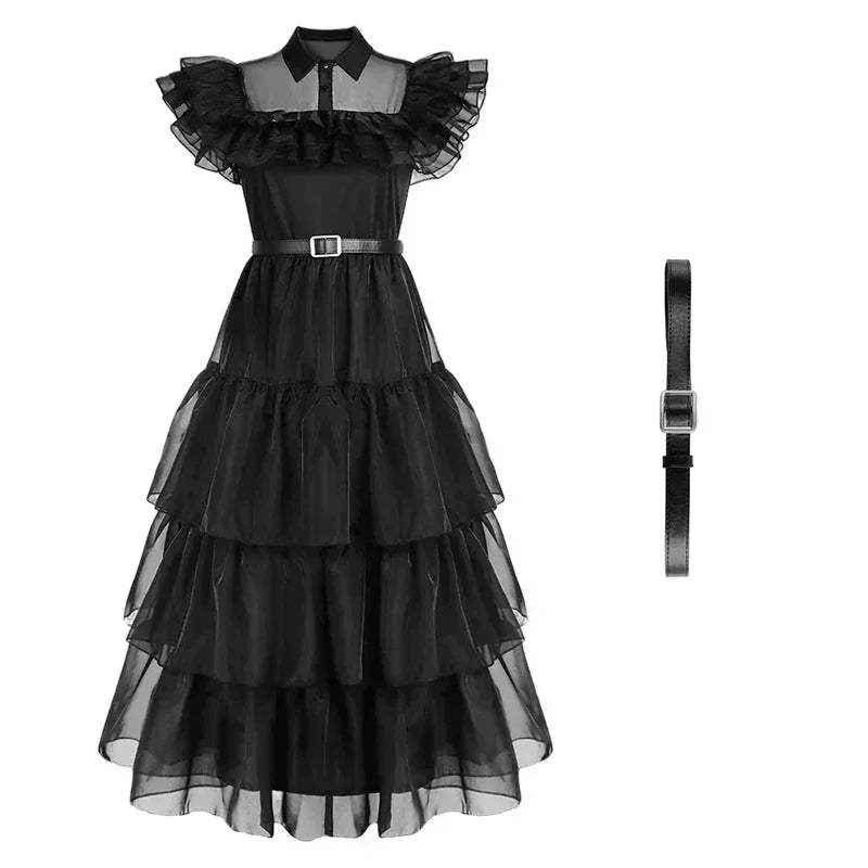 Black tiered dress with a belt on a white background